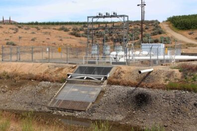 Side of irrigation canal with intake to the pump, dry above the level of the water