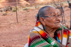 Traditional Authentic Navajo Elderly Woman Posing in Traditional Clothing in a Hogan in Monument Valley Arizona