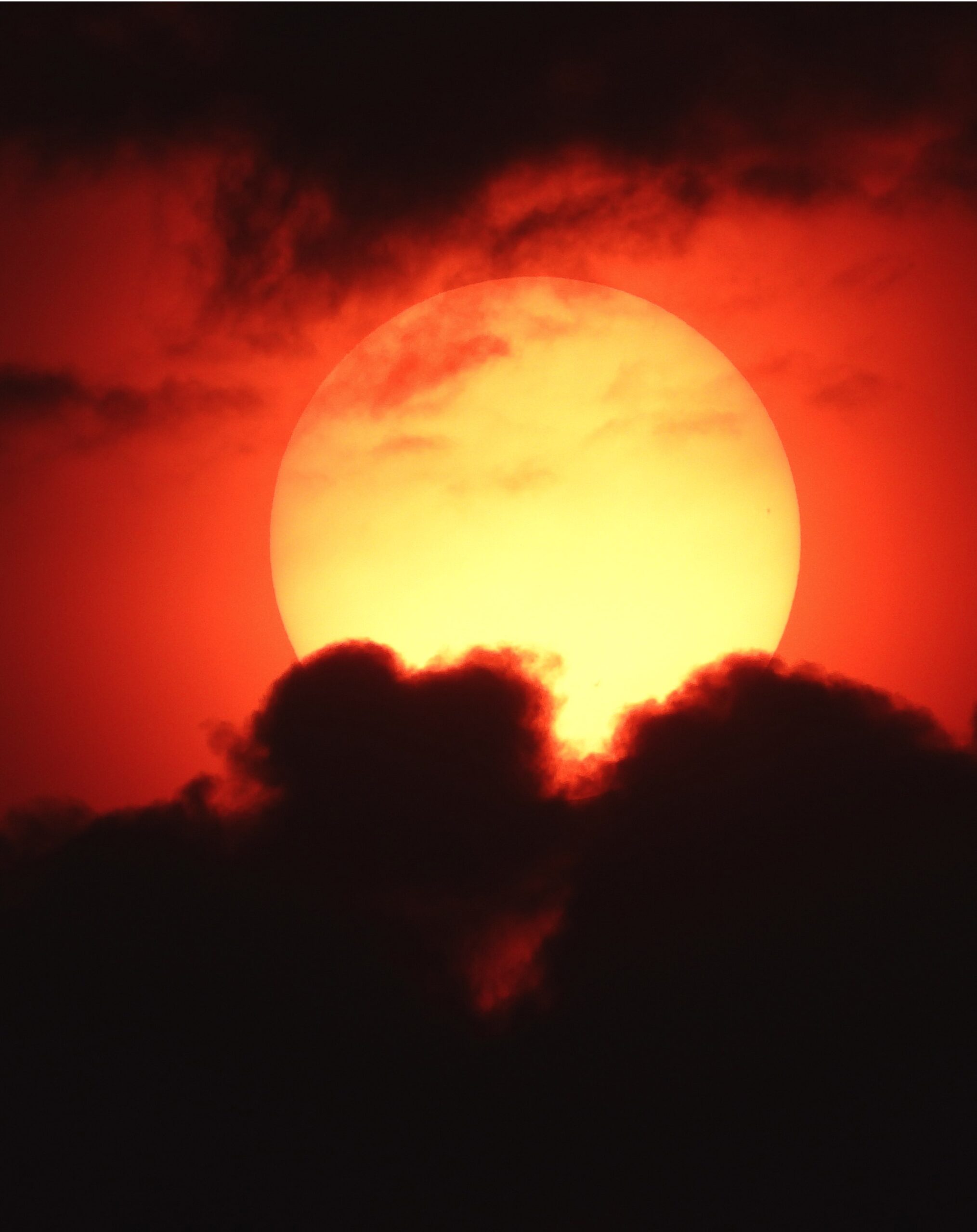 Sun and clouds of smoke