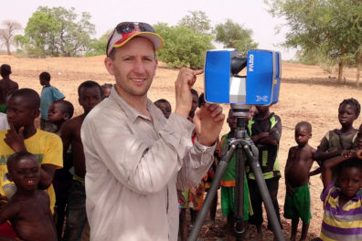 Alex Fremier doing field work
