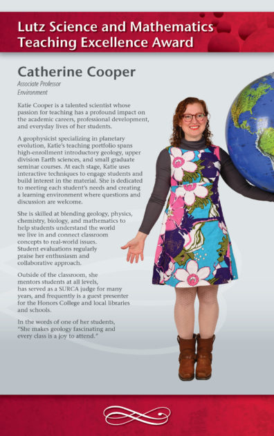 Picture of woman with a large world glob