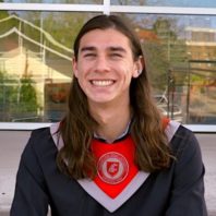 Brenden Campbell in front of building