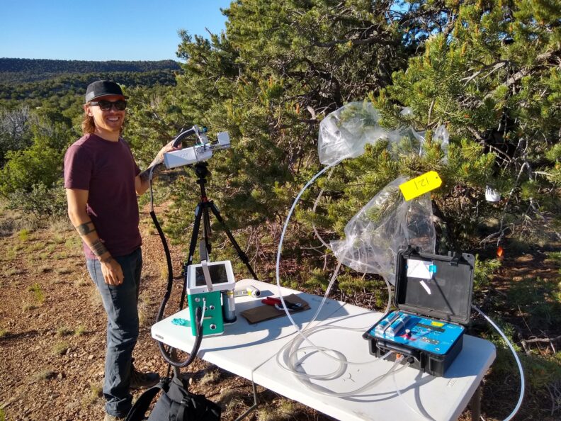 Environment student working in the field.