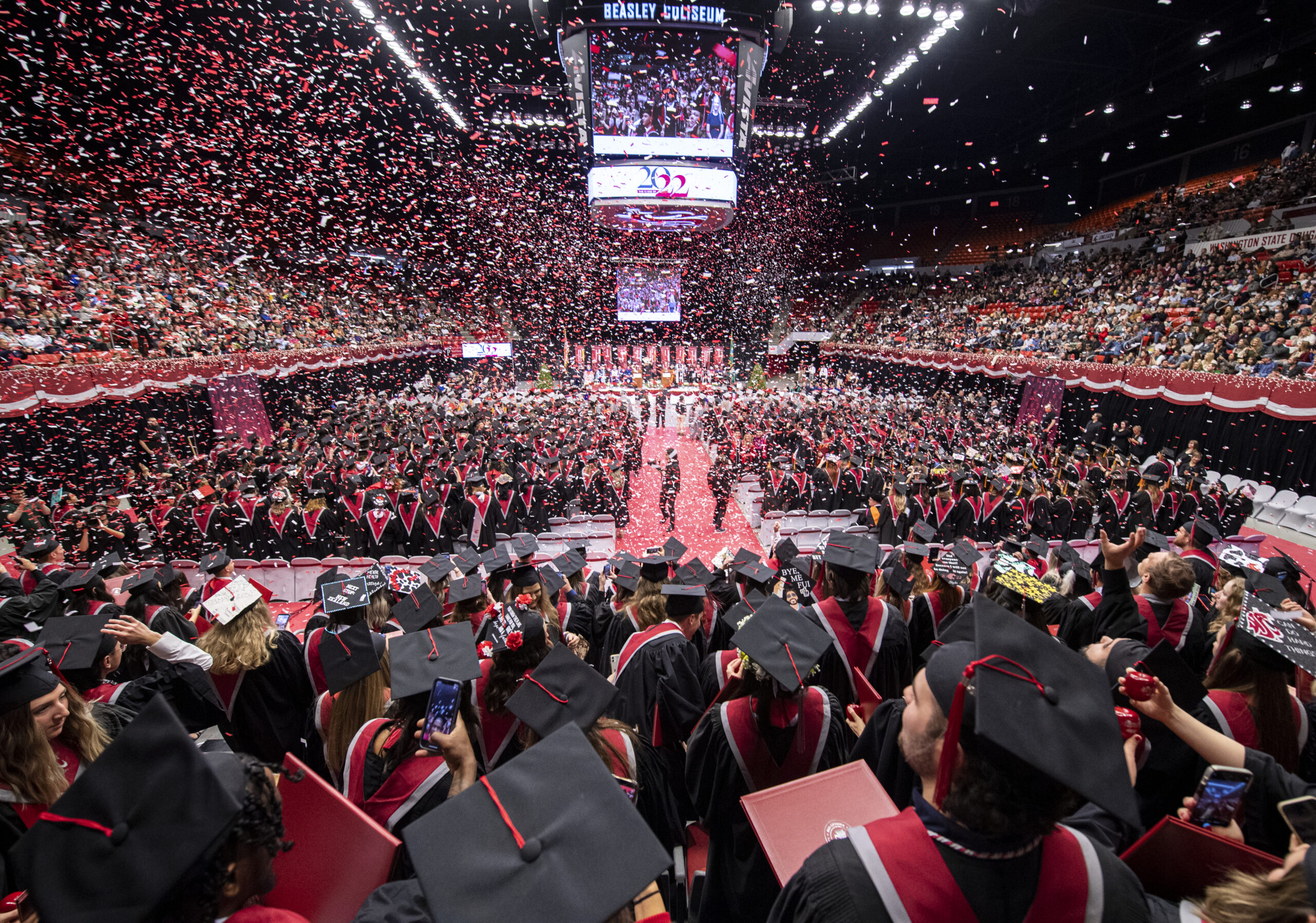 Confetti falling from the ceiling at commencement.