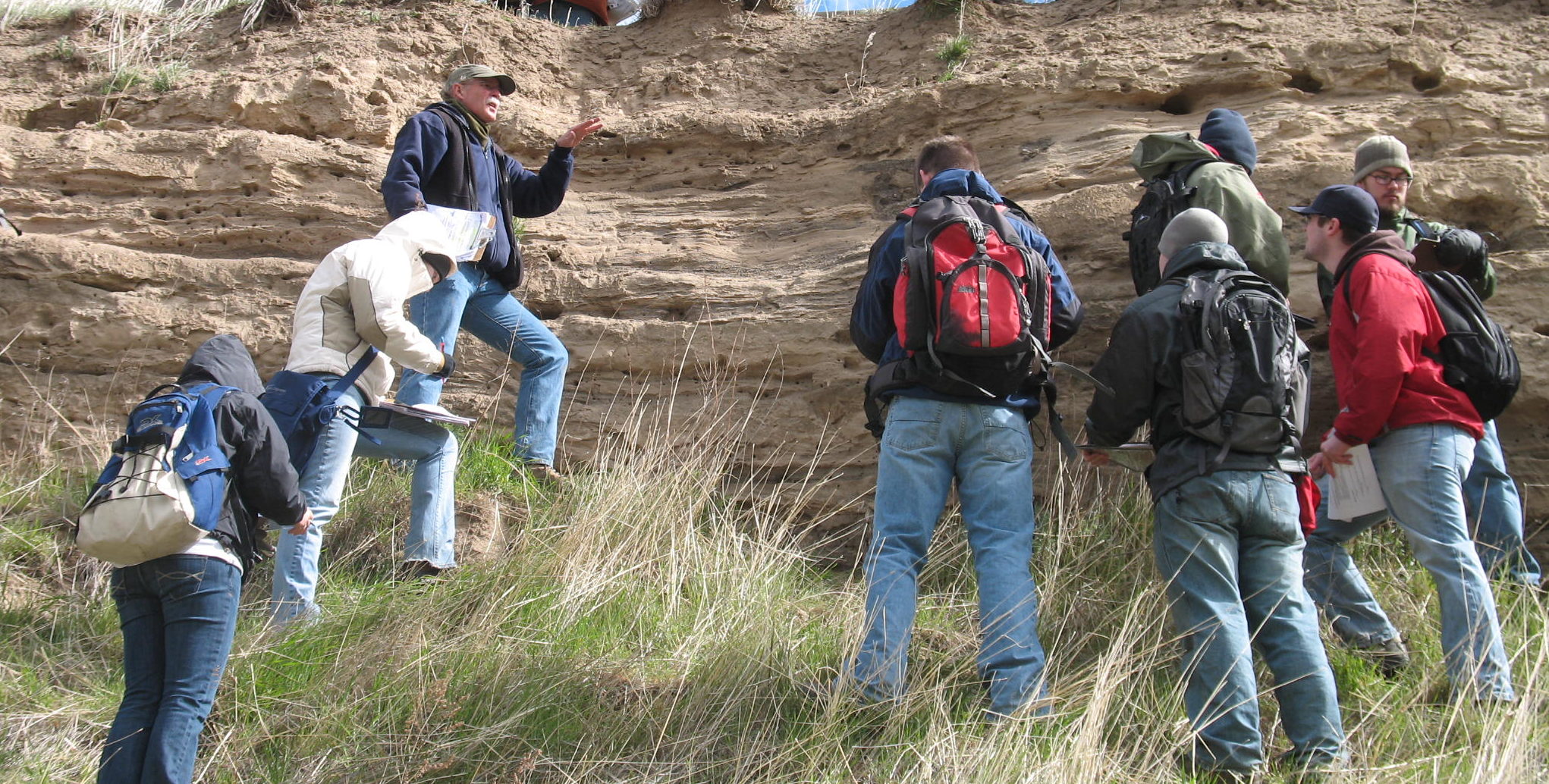 Environment students and instructor in the field.