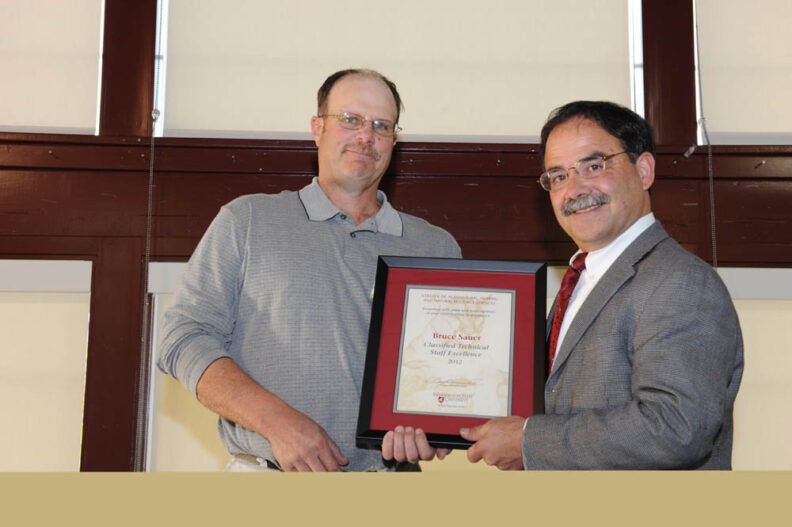 Bruce Sauer receiving an award.