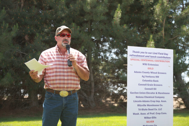 Mike Miller speaking at the noon program.