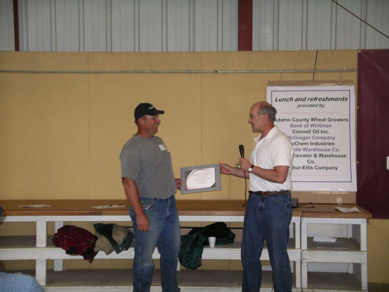 Bruce Sauer receiving an award.