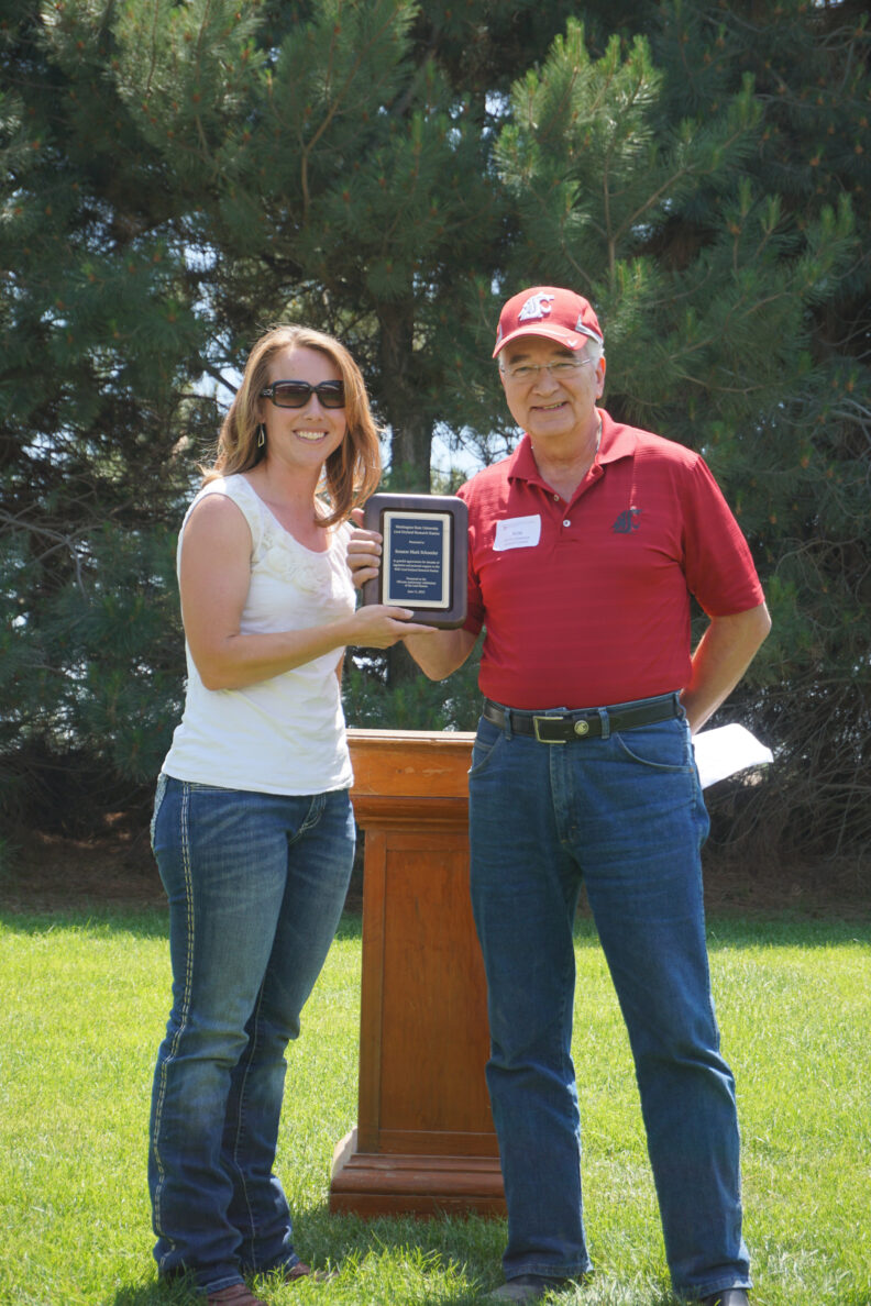 Veronica Schoesler Clinton standing with Dean Mittlehammer.