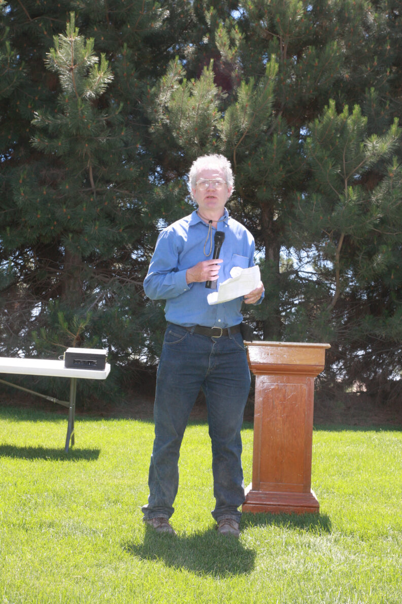 Tim Paulitz standing in front of the crowd.