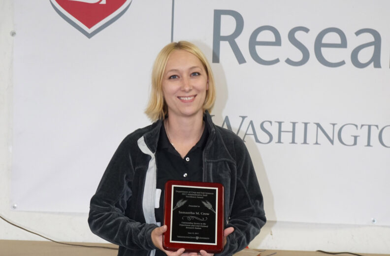 Samantha Crow receiving an award.