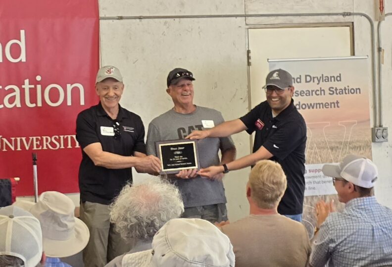 Bruce Sauer receiving an award.