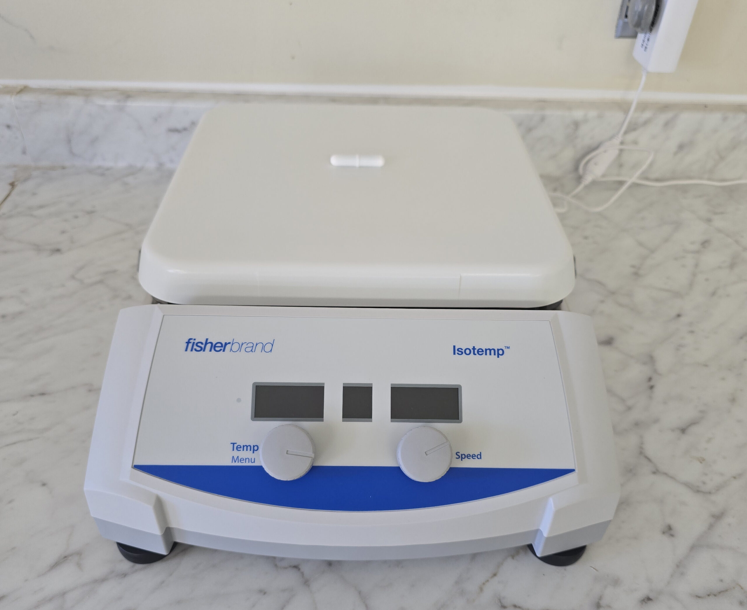 Hotplate stirrer on a counter.