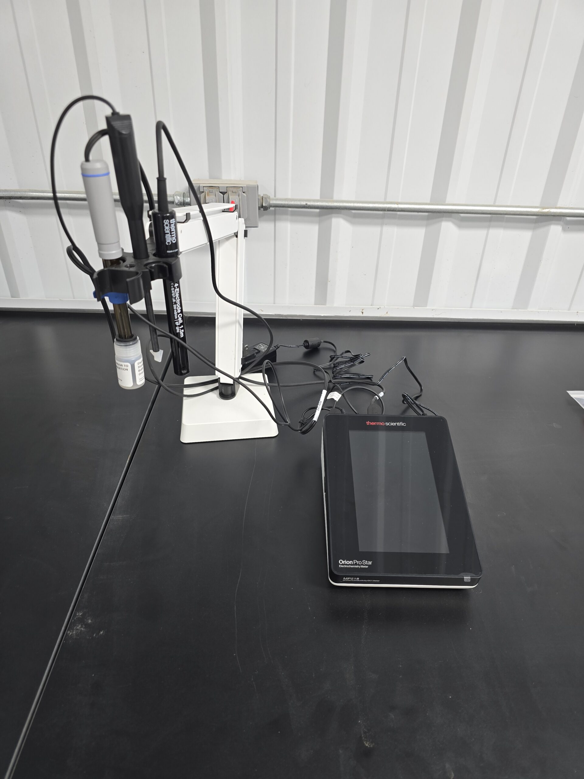 pH Meter sitting on a table.