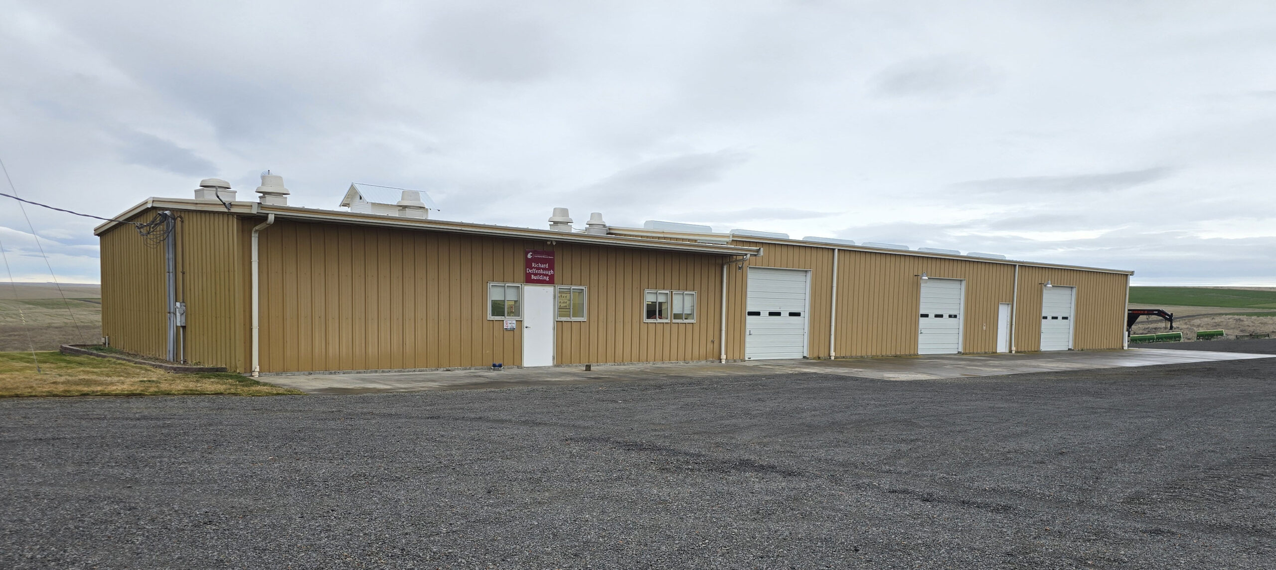 Building with a sign with the WSU logo that says "Richard Deffenbaugh Building."