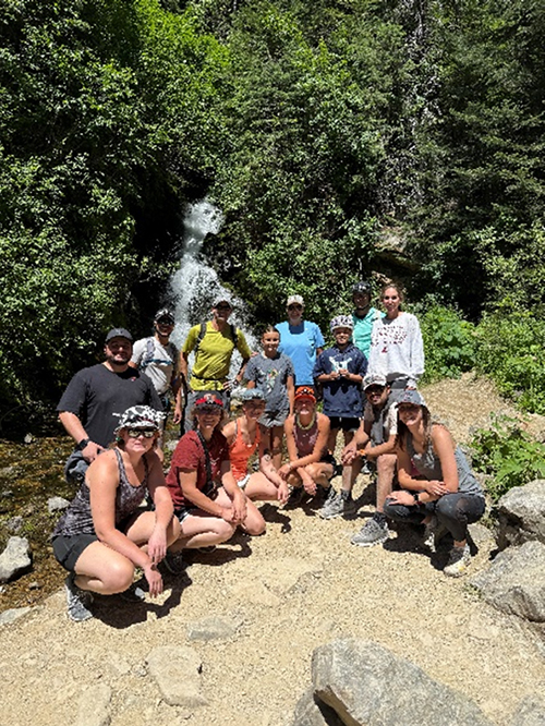 FDIU group outside, next to a small creek.