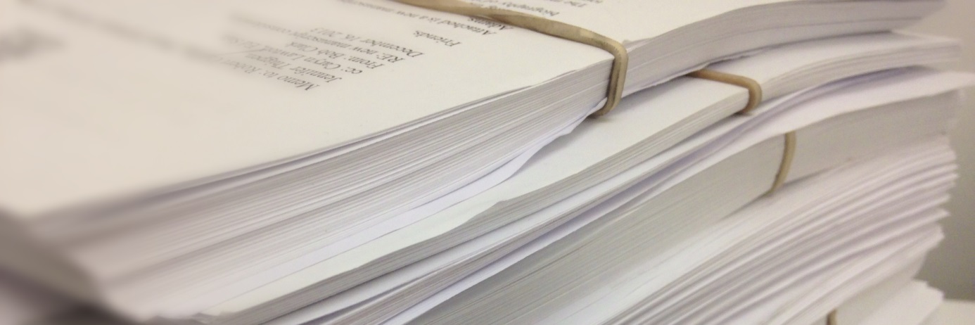 Photograph of stacked manuscripts