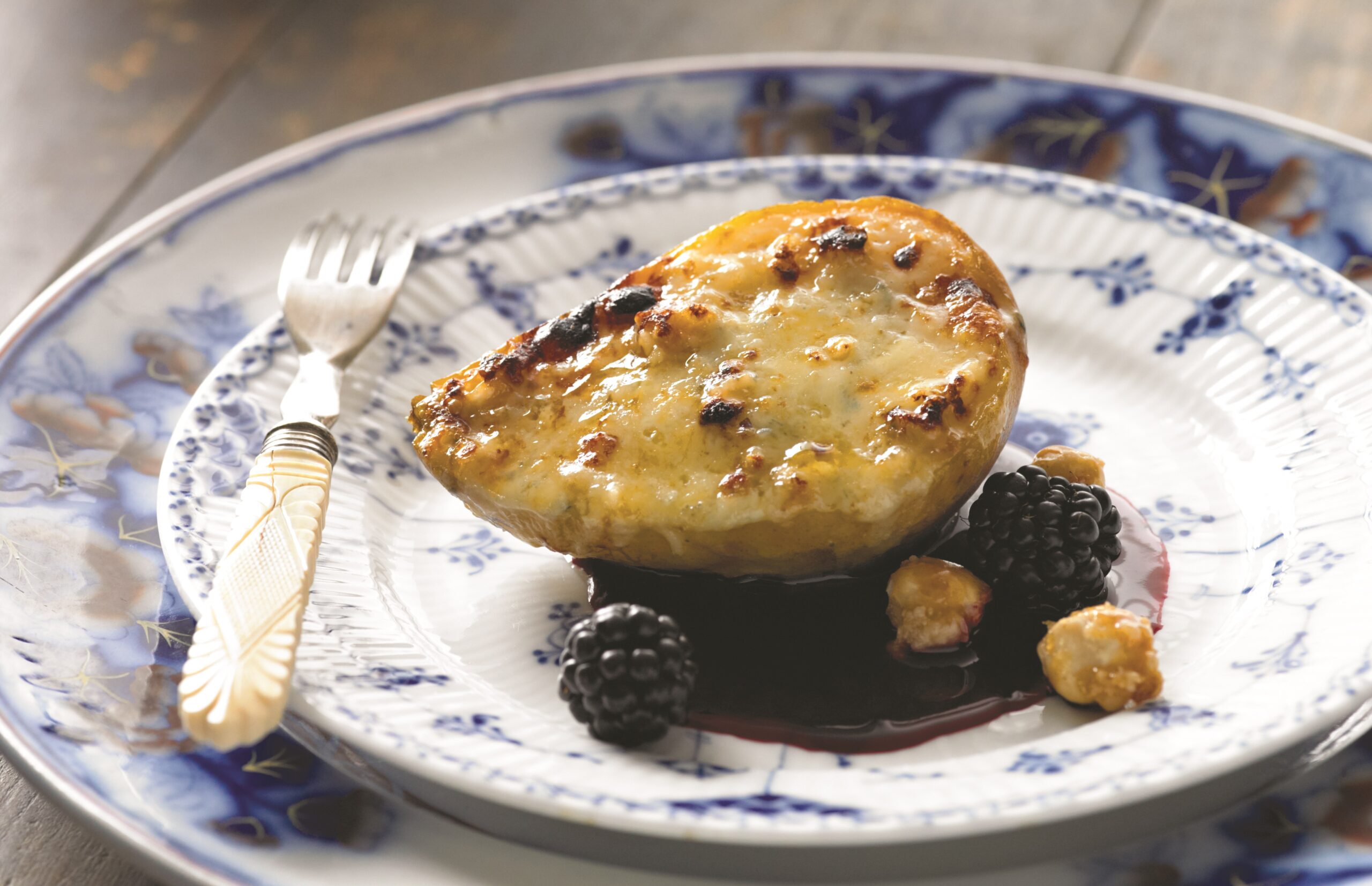 poached pear on a plate