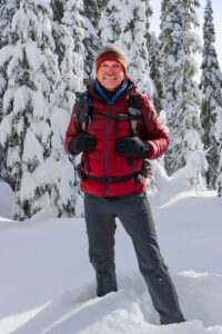 Scott McCorquodale standing in the snow
